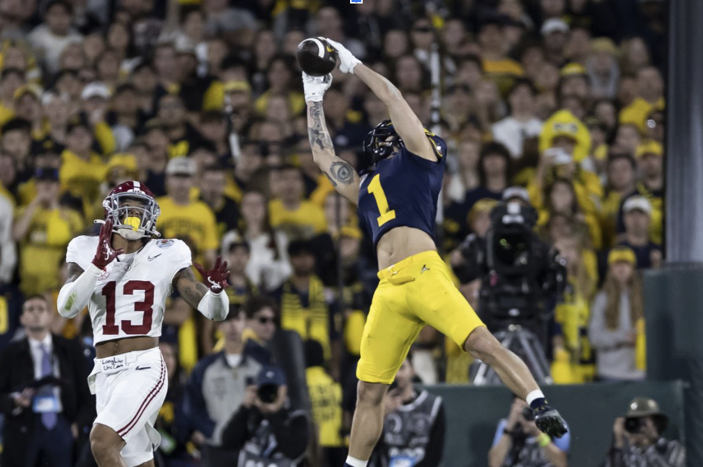 Michigan%E2%80%99s+Roman+Wilson+%28WR%29+catches+what+would+have+been+a+game-bending+interception+during+this+year%E2%80%99s+Rose+Bowl.
